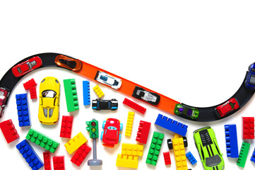 Toy car and racing track isolated on the white