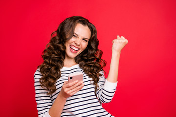 Portrait of nice lovely attractive stylish amazing glad cheerful positive wavy-haired lady wearing...