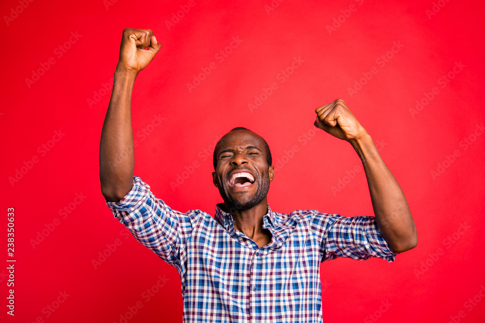 Wall mural portrait of nice handsome attractive cheerful glad positive guy wearing checked shirt showing breakt