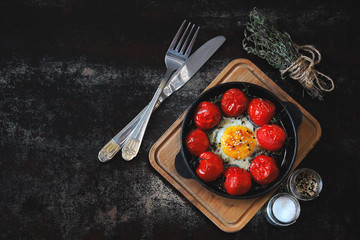 Egg baked with cherry tomatoes. Keto breakfast.
