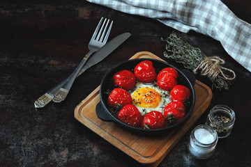 Egg baked with cherry tomatoes. Keto breakfast.