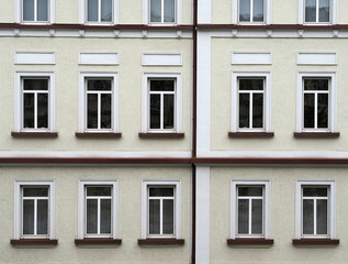 Fototapeta na wymiar House facade with many windows