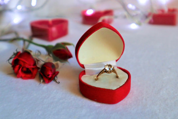  White background with red hearts, gifts and candles. The concept of Valentine Day.