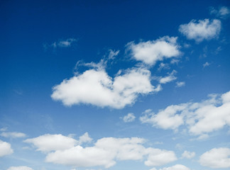 Naklejka na ściany i meble Blue sky with clouds on a sunny day