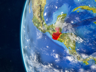 Guatemala from space on model of planet Earth with country borders and very detailed planet surface and clouds.