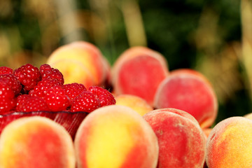 juicy peach with raspberries
