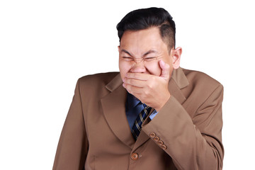 Asian Man Laughing and Covering His Mouth with Hand