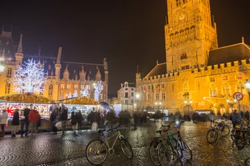 Poster Bruges, Belgium - November 24, 2018: Central Bruges Market Square by night decorated at Christmas. © ANADEL