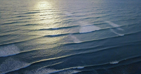 Aerial view beautiful of sea waves from drone. Stock image picture of blue color ocean water, wave, sea surface. Top view on turquoise waves, clear water surface texture. Top view, amazing nature