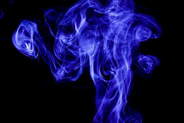 Fototapeta premium Blue smoke on black background