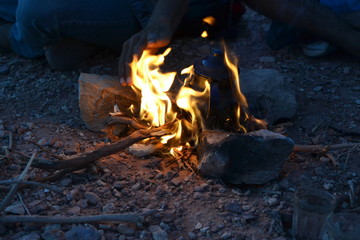 drinking tea with bedouin in sunset evening in Mitzpe Yeriho, Westbank Israel, Judean desert,...