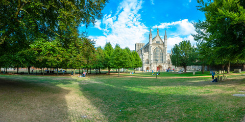 Summer time view of Winchester Cathedral west front - a stitched panorama in 2-1 format, Hampshire,...
