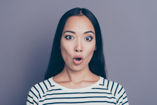 Close-up portrait of nice cute lovely attractive adorable glamorous stylish trendy shocked straight-haired lady in striped pullover opened mouth isolated on gray pastel background
