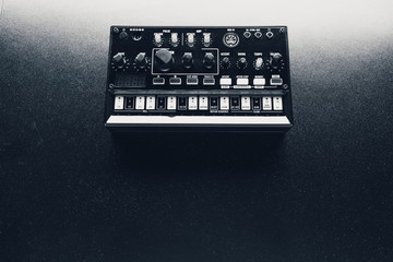 black analog synthesizer, close-up view