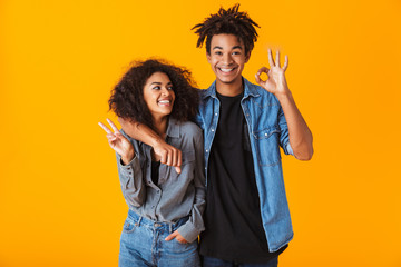 Happy young african couple wearing casual clothes