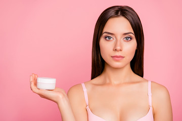 New gel ad. Close-up portrait of her she nice cute feminine attractive calm confident lady in beige bra demonstrating product on palm isolated over pink pastel background