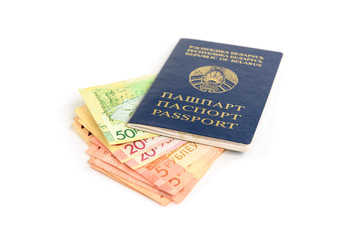 Fototapeta premium Belarusian passport and new banknotes in the Republic of Belarus isolated on white background.