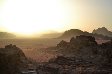 Fototapeta na wymiar Sunset during Desert tour through sand dunes of Wadi Rum wilderness, Jordan, Middle East, hiking, climbing, driving