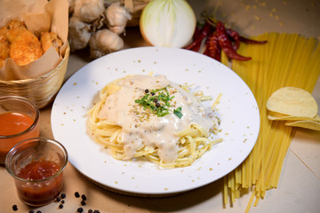 Spaghetti Carbonara,Ingredients for Pasta Carbonara on brown background