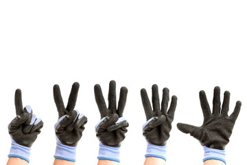 Hand wearing working protective gloves with gesture number from one to five isolated on white background.