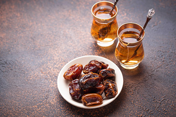 Traditional arabic tea and dry dates