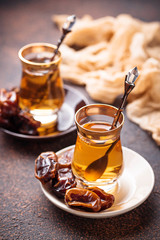 Traditional arabic tea and dry dates