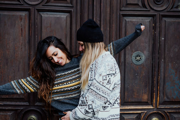 Couple women enjoying on the street in Madrid city