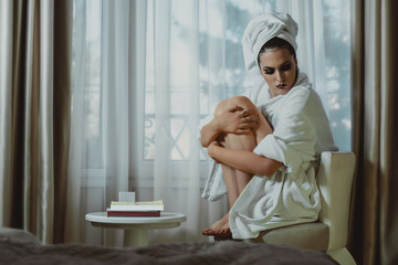 Beautiful glamorous woman in bathrobe