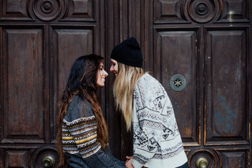 Couple women enjoying on the street in Madrid city