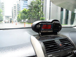 View from cab with meter display Time, Distance and Fare in dashboard interior