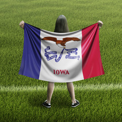 Women and Iowa flag
