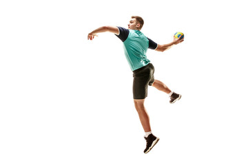 Fototapeta na wymiar The fit caucasian young male handball player at studio on white background. Fit athlete isolated on white. The man in action, motion, movement. attack and defense concept