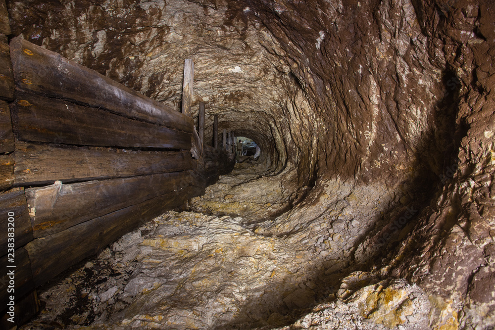 Wall mural Underground abandoned gold iron ore mine shaft tunnel gallery passage 