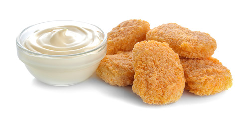 chicken nuggets with white sauce on a white isolated background. fast food
