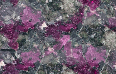purple and black eudialyte seamless texture macro