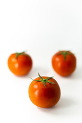 Ripe tomato isolated on white background.