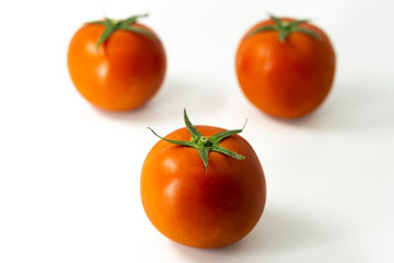 Ripe tomato isolated on white background.