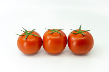 Ripe tomato isolated on white background.