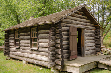 old log cabin with door open