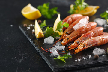 Tiger shrimps with spices and lemon. langoustines