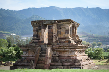 Fototapeta na wymiar Candi Setyaki hindu temple, near Arjuna complex in Dieng Plateau, Central Java, Indonesia.
