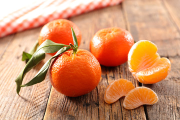clementine fruit on wood background