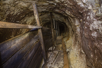 Underground abandoned gold iron ore mine shaft tunnel gallery passage incline