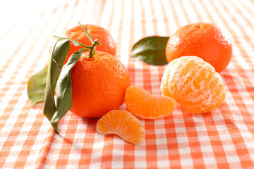 clementine fruit on wood background