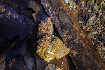 Underground abandoned gold iron ore mine shaft tunnel gallery passage wtih calcite specimen crystalls