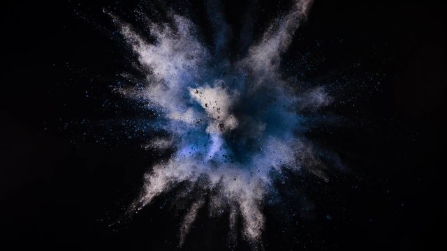 Color powder explosion in super slow motion isolated on black background. Shot with high speed cinema camera at 1000fps