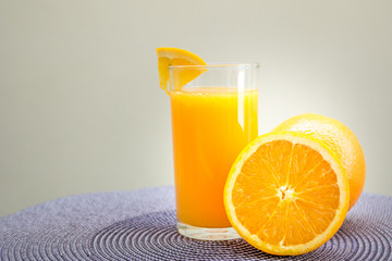 oranges and orange juice on white background,