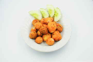 Fried meatballs on white background