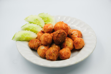 Fried meatballs on white background