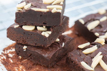 Dark chocolate brownies with almond topping.